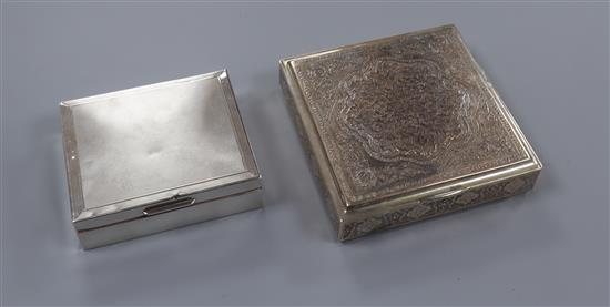 A Persian white metal box and a silver cigarette box.